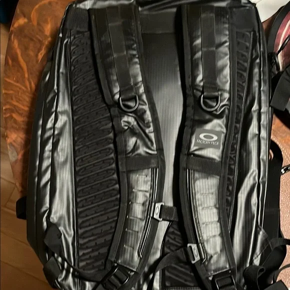Oakley Waterproof Black Roll-Top Backpack with Tactical Design - Picture 2 of 7